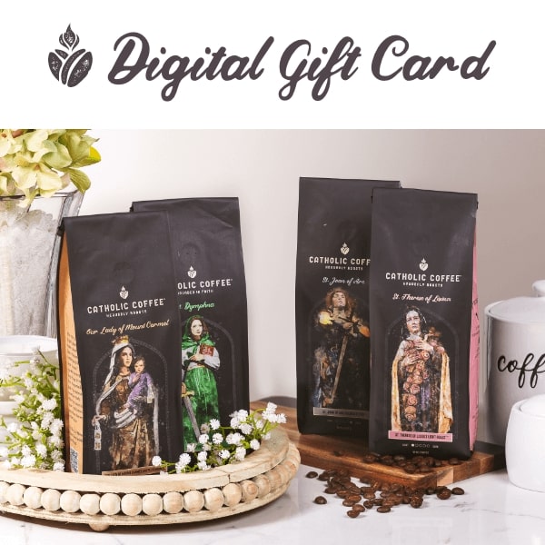 Catholic Coffee packages on a decorative stand with flowers and coffee beans, featuring a digital gift card overlay.